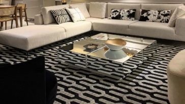 sala de estar luxuosa e moderna com mesa de centro espelhada