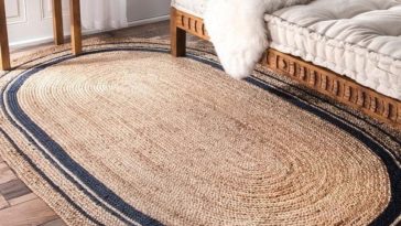 tapete de sisal oval no hall de entrada