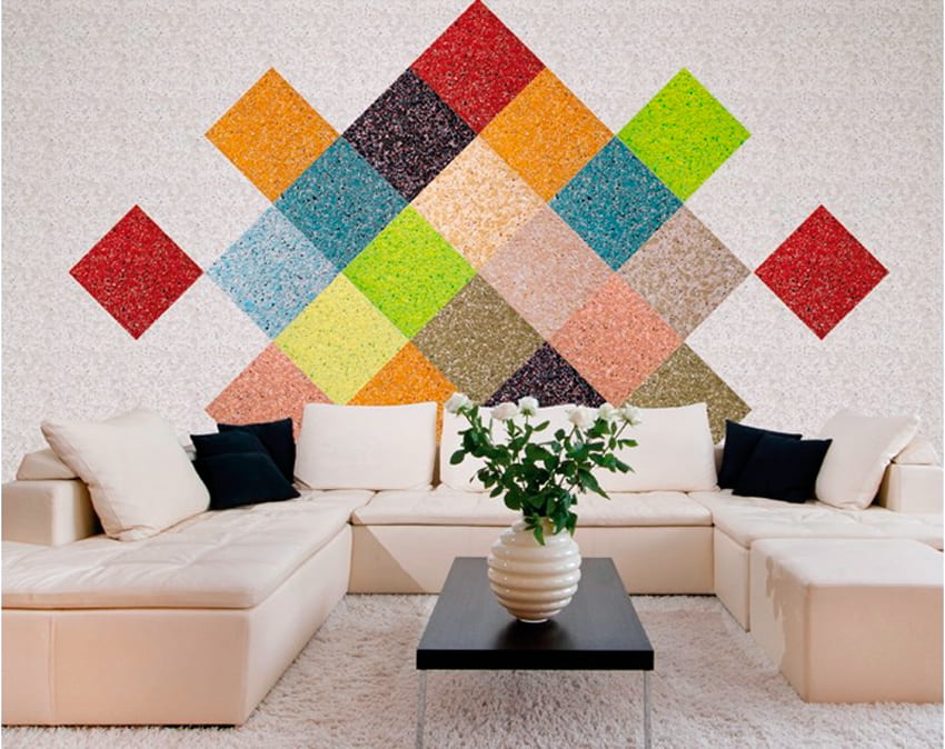 Composition originale de papier peint liquide sous forme de carrés multicolores sur le mur