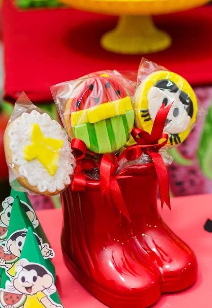 Sucettes décorées du personnage Magali pour la table de bonbons